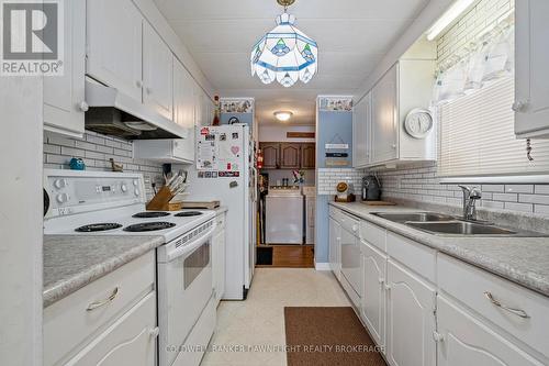 4 Redford Drive, South Huron (Exeter), ON - Indoor Photo Showing Kitchen With Double Sink