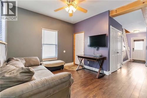 Living room featuring wood type floors and a ceiling fan - 112 Eagle Avenue, Brantford, ON - Indoor