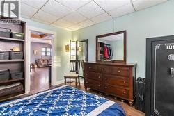 Bedroom with wood type floors - 