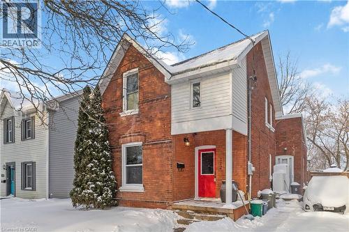 Front of home featuring driveway, walk up to front door, and lawn. - 112 Eagle Avenue, Brantford, ON - Outdoor
