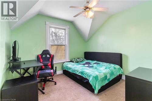 Bedroom with vaulted ceiling, carpet flooring, and ceiling fan - 112 Eagle Avenue, Brantford, ON - Indoor Photo Showing Bedroom