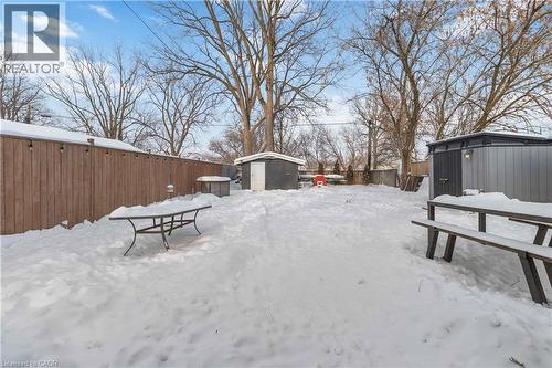 Yard featuring a storage area, shed, and fenced backyard - 112 Eagle Avenue, Brantford, ON - Outdoor With Backyard