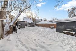 Large fenced yard with a shed - 