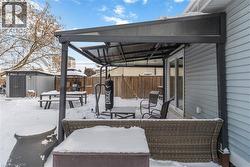 Large yard featuring a storage shed, a fenced backyard, outdoor lounge area, and a gazebo - 