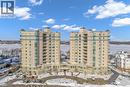 4955 Riverside Drive Unit# 202, Windsor, ON  - Outdoor With Body Of Water With Balcony With Facade 