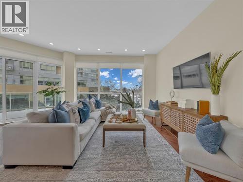 4955 Riverside Drive Unit# 202, Windsor, ON - Indoor Photo Showing Living Room With Fireplace