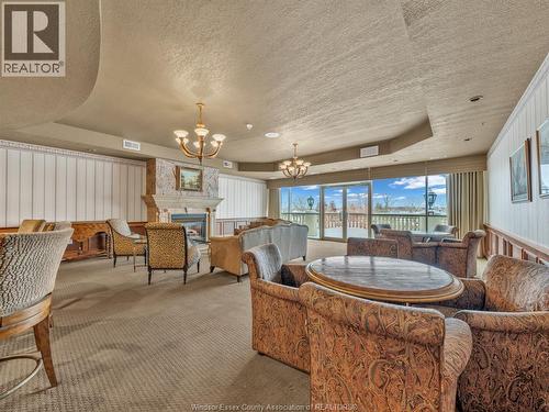 4955 Riverside Drive Unit# 202, Windsor, ON - Indoor With Fireplace