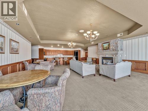 4955 Riverside Drive Unit# 202, Windsor, ON - Indoor With Fireplace
