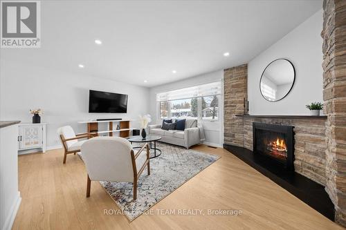 20 Whitburn Crescent, Ottawa, ON - Indoor Photo Showing Living Room With Fireplace