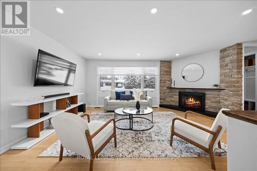 20 Whitburn Crescent, Ottawa, ON - Indoor Photo Showing Living Room With Fireplace