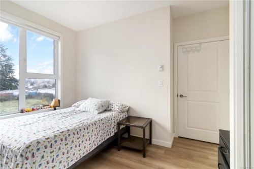 202-815 Orono Ave, Langford, BC - Indoor Photo Showing Bedroom