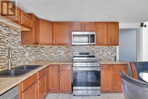 86 Gibbons Street, Oshawa, ON - Indoor Photo Showing Kitchen With Double Sink