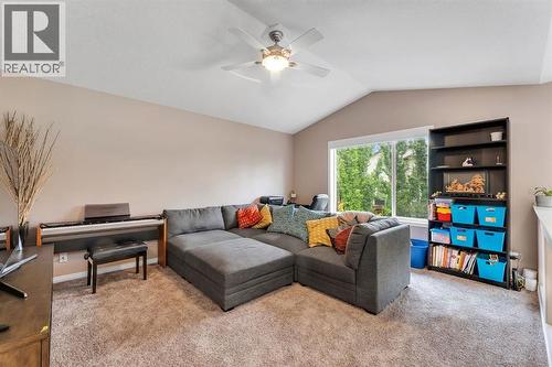 405 Kincora Drive Nw, Calgary, AB - Indoor Photo Showing Living Room