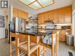 Large granite island with storage - 