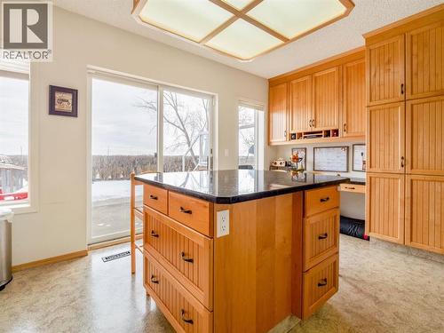 Sliding door out to backyard - 90 Chippewa Crescent W, Lethbridge, AB - Indoor Photo Showing Kitchen