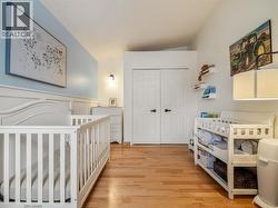 Upstairs bedroom with double closet - 
