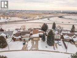 Drone view of house with city & coulee views - 