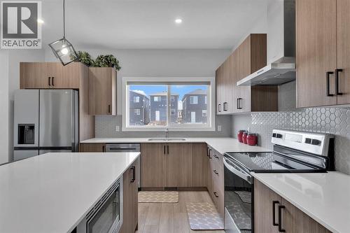 67 Corner Glen Gardens Ne, Calgary, AB - Indoor Photo Showing Kitchen With Stainless Steel Kitchen