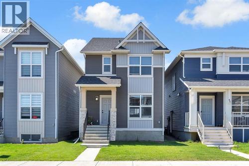 67 Corner Glen Gardens Ne, Calgary, AB - Outdoor With Facade