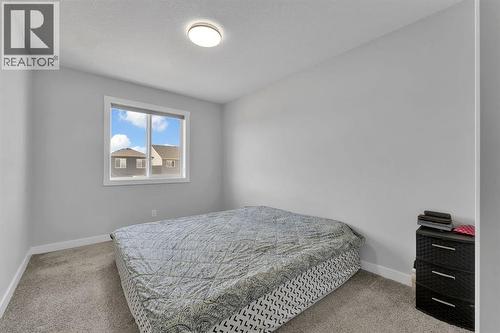 67 Corner Glen Gardens Ne, Calgary, AB - Indoor Photo Showing Bedroom
