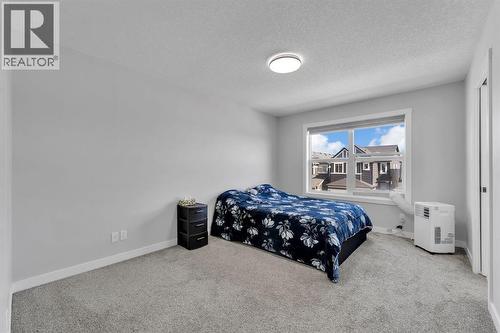 67 Corner Glen Gardens Ne, Calgary, AB - Indoor Photo Showing Bedroom