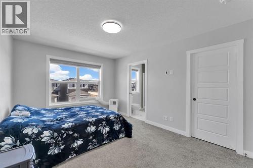 67 Corner Glen Gardens Ne, Calgary, AB - Indoor Photo Showing Bedroom