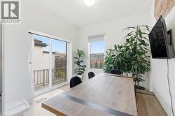 Office space with light wood-style flooring - 