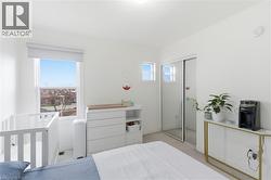 Bedroom featuring carpet floors and a closet - 