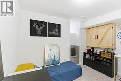 Bedroom with light colored carpet - 