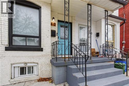 View of exterior entry with brick siding - 40 Fullerton Avenue, Hamilton, ON - Outdoor With Exterior