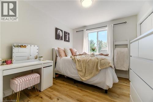Bedroom featuring light wood finished floors - 5 Newport Lane, Port Dover, ON - Indoor Photo Showing Bedroom