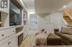 Bedroom with recessed lighting and light wood-style floors - 