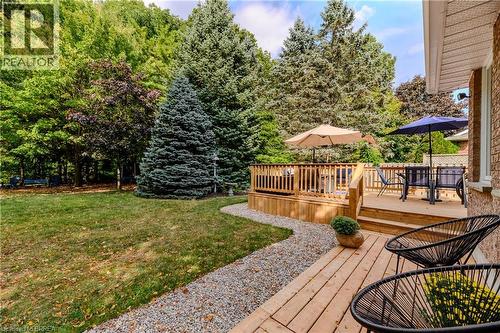Deck with outdoor dining area and a yard - 5 Newport Lane, Port Dover, ON - Outdoor With Deck Patio Veranda