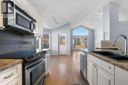 58 Chaparral Close Se, Calgary, AB - Indoor Photo Showing Kitchen With Double Sink