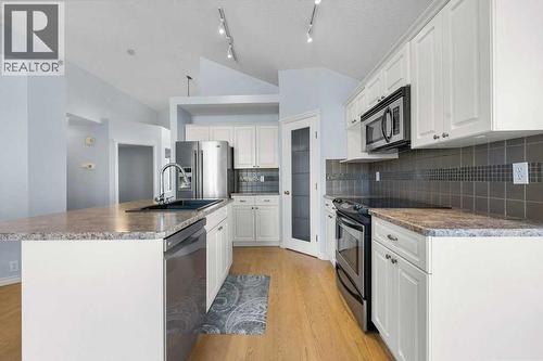 58 Chaparral Close Se, Calgary, AB - Indoor Photo Showing Kitchen With Upgraded Kitchen