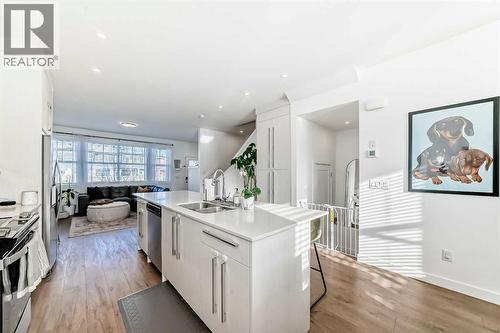 197 Dawson Way, Chestermere, AB - Indoor Photo Showing Kitchen With Double Sink With Upgraded Kitchen