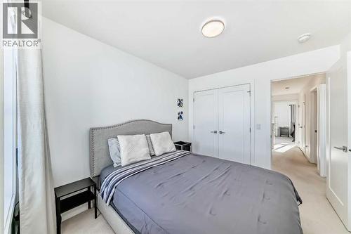 197 Dawson Way, Chestermere, AB - Indoor Photo Showing Bedroom