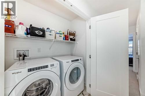 197 Dawson Way, Chestermere, AB - Indoor Photo Showing Laundry Room
