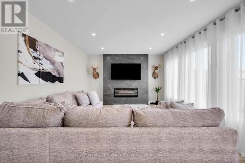 7251 Silver Creek Circle, London South (South V), ON - Indoor With Fireplace