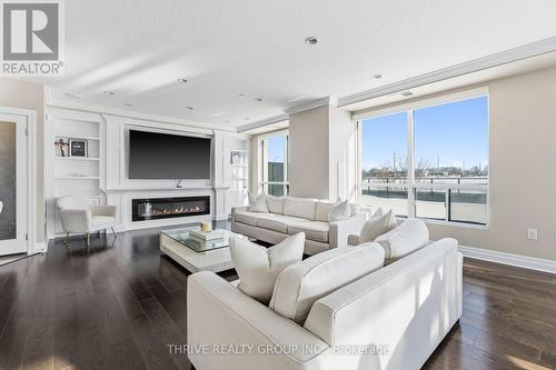 205 - 240 Villagewalk Boulevard, London North (North R), ON - Indoor Photo Showing Living Room With Fireplace