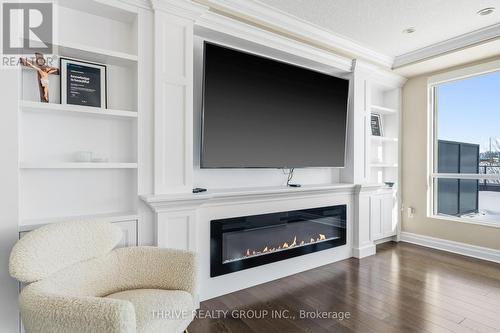 205 - 240 Villagewalk Boulevard, London North (North R), ON - Indoor Photo Showing Living Room With Fireplace