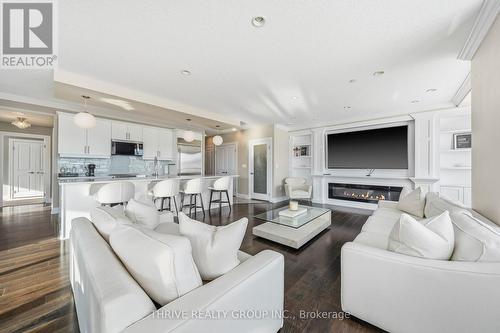 205 - 240 Villagewalk Boulevard, London North (North R), ON - Indoor Photo Showing Living Room With Fireplace