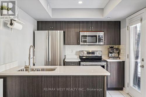 148 - 80 Parrotta Drive, Toronto, ON - Indoor Photo Showing Kitchen With Stainless Steel Kitchen With Double Sink