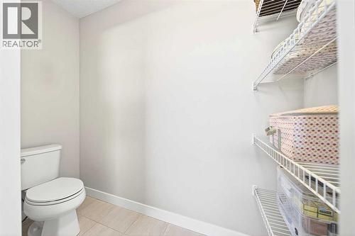 13 Cranbrook Close Se, Calgary, AB - Indoor Photo Showing Bathroom