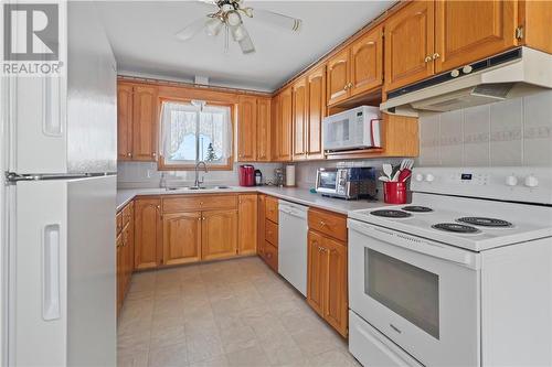 53 Walcot Street, Little Current, ON - Indoor Photo Showing Kitchen With Double Sink