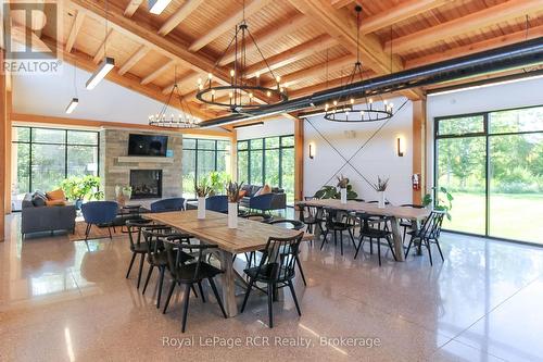 130 Courtland Street, Blue Mountains, ON - Indoor Photo Showing Dining Room With Fireplace