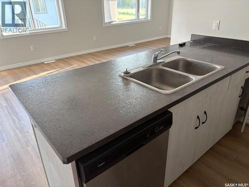 322 James Street, Esterhazy, SK - Indoor Photo Showing Kitchen With Double Sink