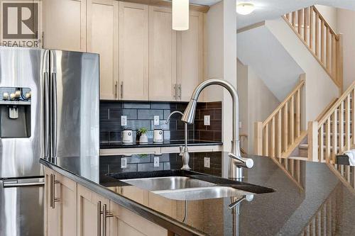 93 Silverado Bank Circle Sw, Calgary, AB - Indoor Photo Showing Kitchen With Double Sink