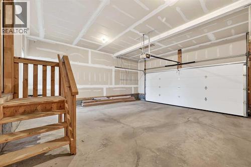 93 Silverado Bank Circle Sw, Calgary, AB - Indoor Photo Showing Garage