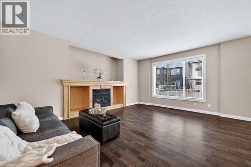 93 Silverado Bank Circle Sw, Calgary, AB - Indoor Photo Showing Living Room With Fireplace